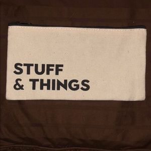 Flat canvas cream colored cosmetic bag